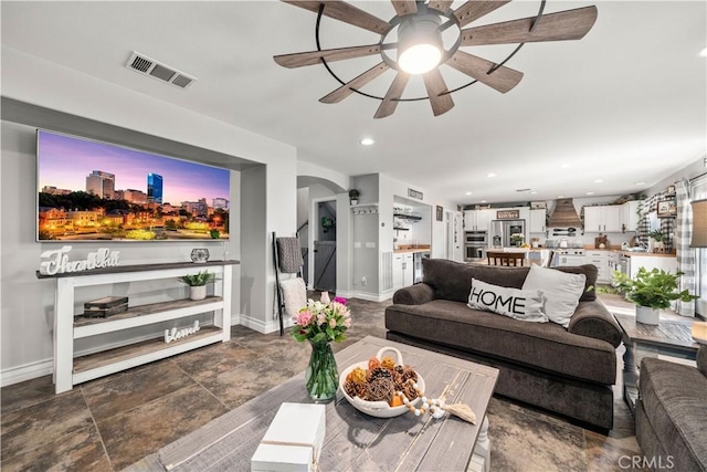 living room with ceiling fan