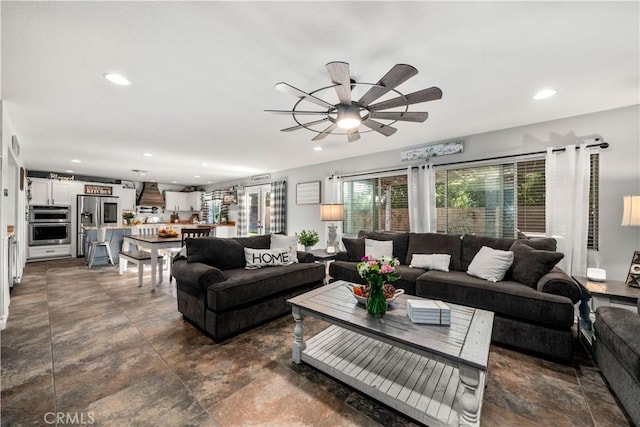 living room featuring ceiling fan