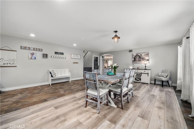 dining space featuring light hardwood / wood-style flooring