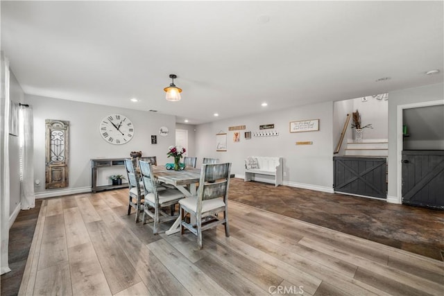 dining room featuring light wood-type flooring