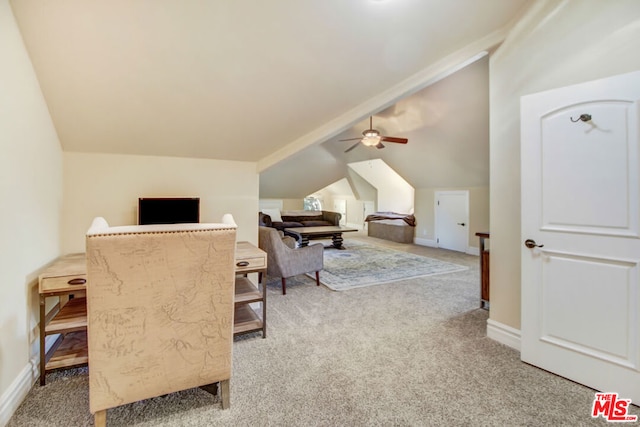 carpeted office featuring ceiling fan and lofted ceiling