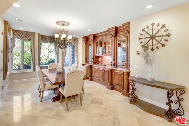 dining room with an inviting chandelier