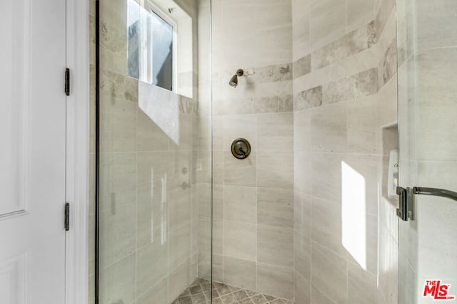 bathroom with an enclosed shower