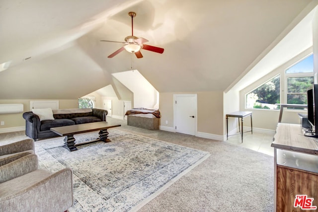 carpeted living room featuring ceiling fan and vaulted ceiling