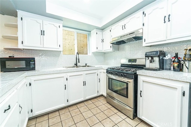 kitchen with white cabinetry, sink, and gas stove