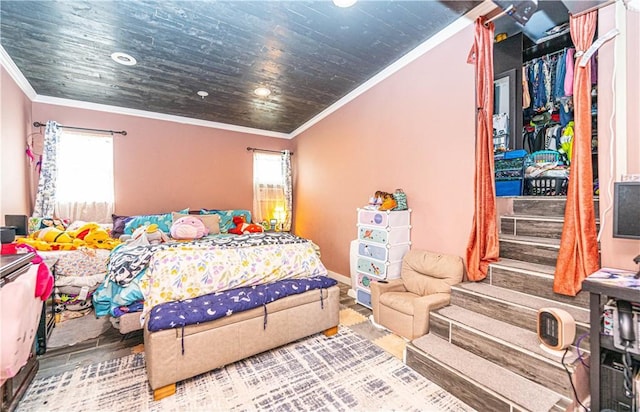 bedroom featuring ornamental molding and wooden ceiling