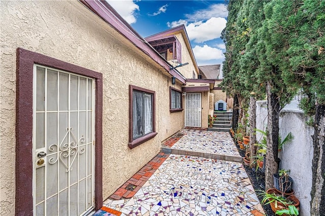 view of side of home featuring a patio