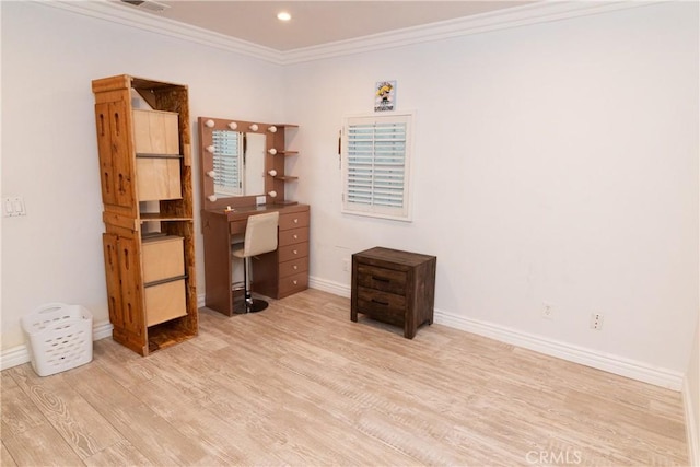 office space with crown molding and light hardwood / wood-style floors