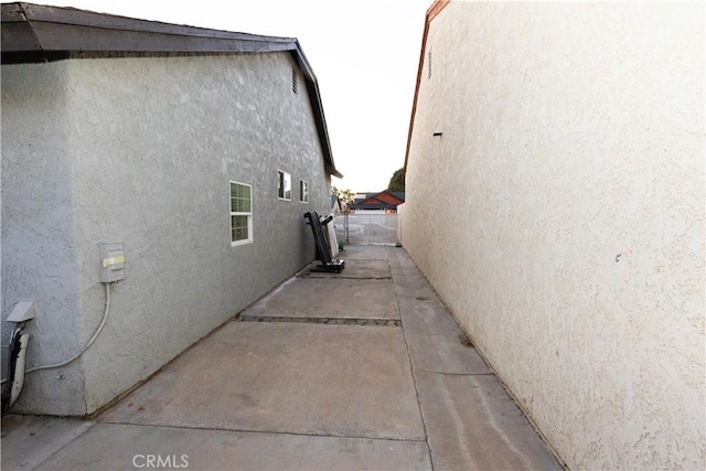 view of home's exterior with a patio