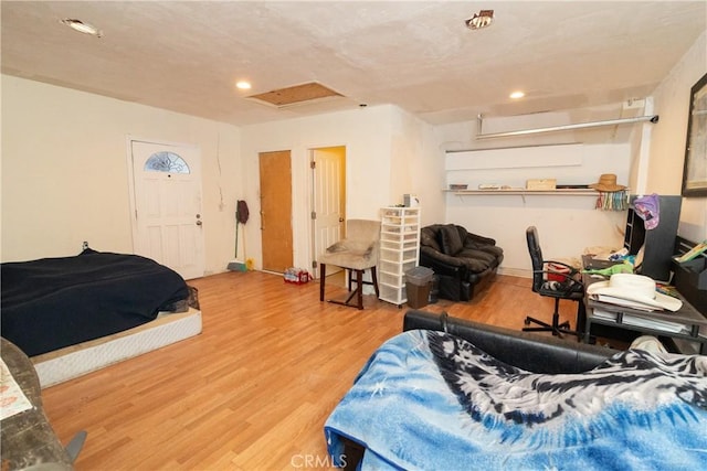 bedroom with hardwood / wood-style floors