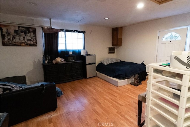 bedroom featuring light wood-type flooring