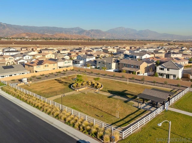 drone / aerial view featuring a mountain view