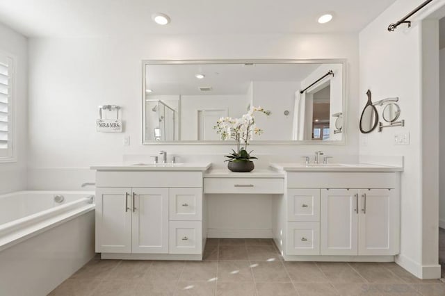 bathroom featuring vanity, separate shower and tub, and tile patterned flooring