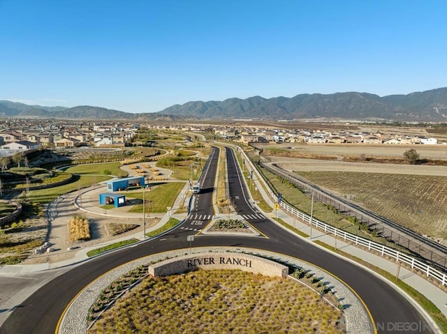 drone / aerial view featuring a mountain view