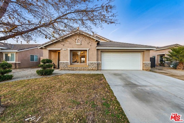 ranch-style house featuring a garage