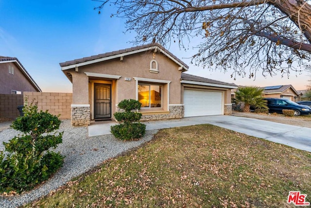 view of front of house with a garage