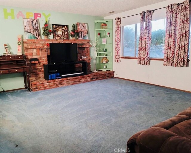 living room with a textured ceiling and carpet flooring