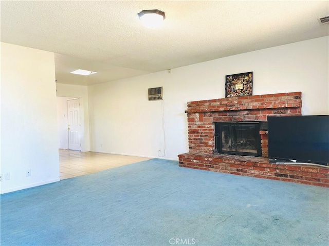10907 Bartlett, Adelanto, CA 92301 - unfurnished living room with carpet, a fireplace, a textured ceiling, and baseboards