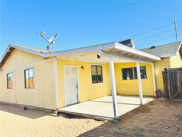 10907 Bartlett, Adelanto, CA 92301 - rear view of house with a patio area