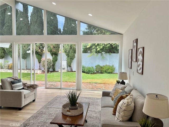 sunroom with lofted ceiling