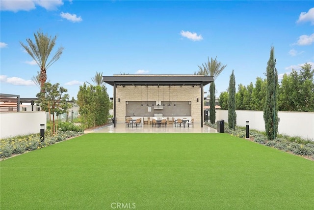 view of yard with a patio area and fence