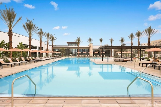 view of swimming pool featuring a patio area