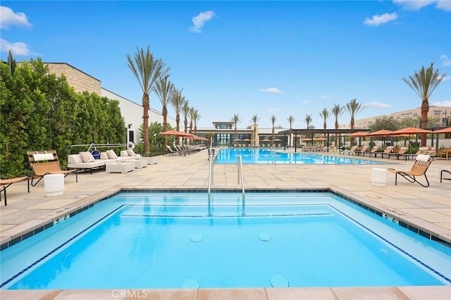 view of swimming pool featuring a patio