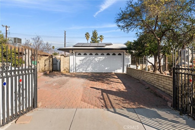 garage featuring solar panels