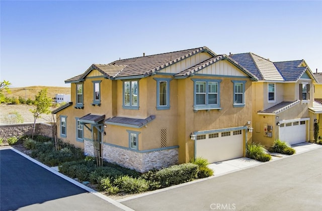 view of front of property with a garage