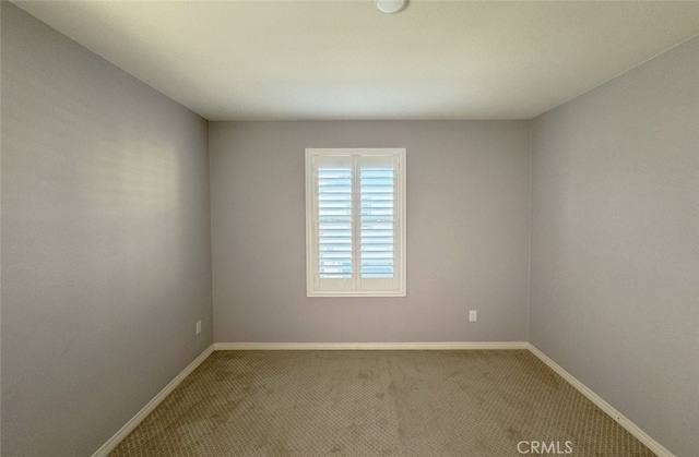 view of carpeted spare room