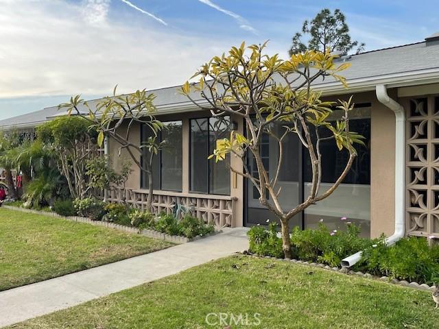 exterior space featuring a front lawn