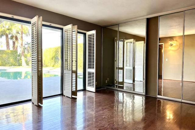 doorway featuring dark hardwood / wood-style flooring