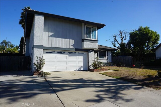 front of property featuring a garage