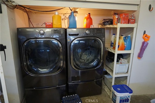 washroom with washer and dryer and laundry area