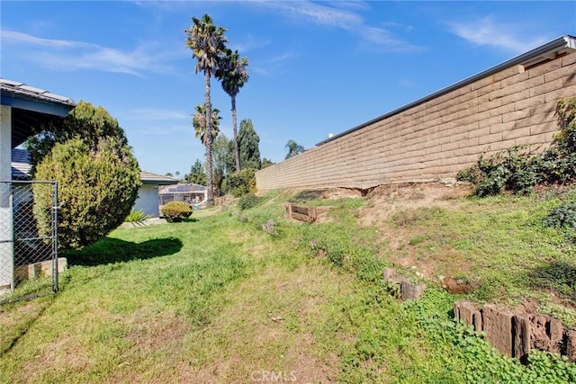 view of yard featuring fence