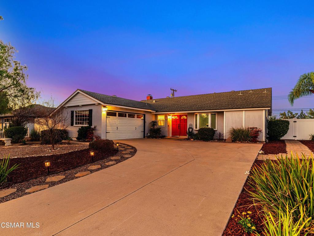 ranch-style house featuring a garage