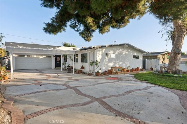 single story home featuring a garage