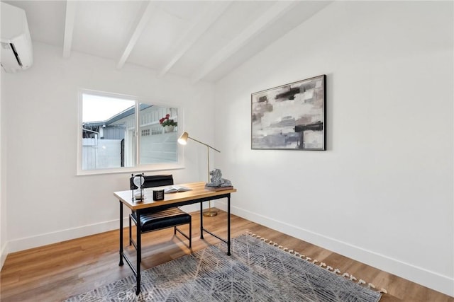 office space with vaulted ceiling with beams, hardwood / wood-style floors, and an AC wall unit