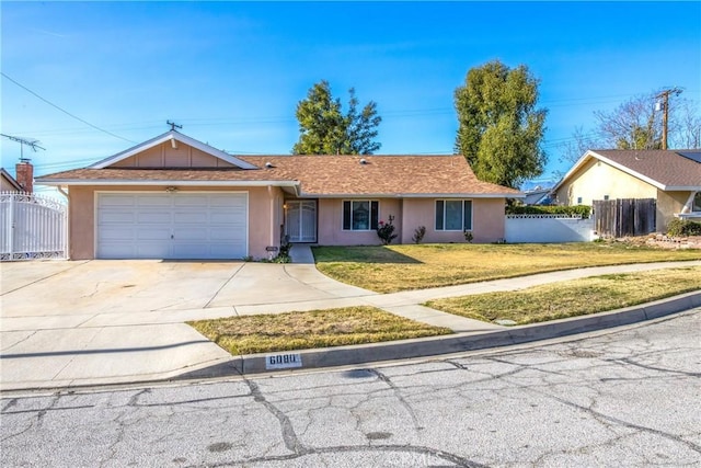 single story home featuring a front yard and a garage