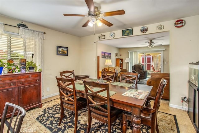 dining area with ceiling fan