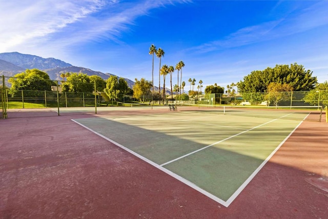 view of sport court with a mountain view