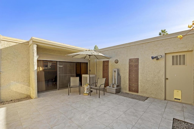 view of patio / terrace featuring central AC unit