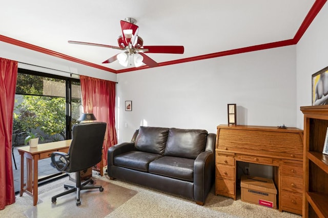 carpeted office featuring ceiling fan and ornamental molding