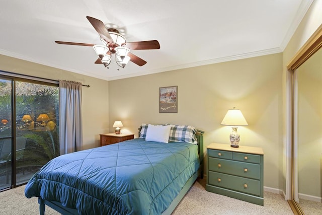 carpeted bedroom featuring ceiling fan, ornamental molding, and access to outside