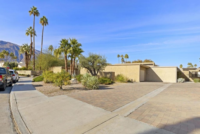 view of front of property with a mountain view