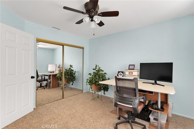 office space with ceiling fan and carpet flooring