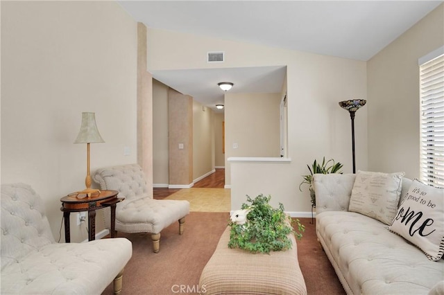 living room with vaulted ceiling