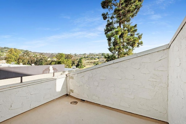 view of patio / terrace with a balcony