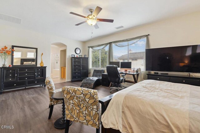 bedroom featuring ceiling fan and dark wood-type flooring