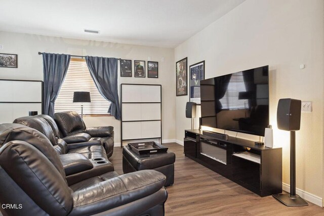 living room with wood-type flooring